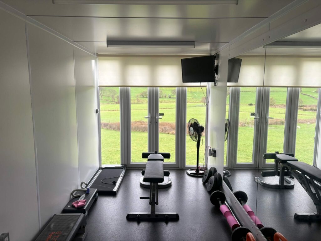 Shipping container gym - large windows