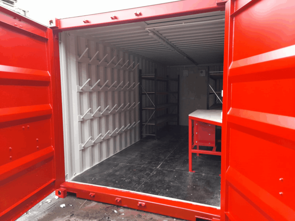 Interior of red 20 ft storage container.
